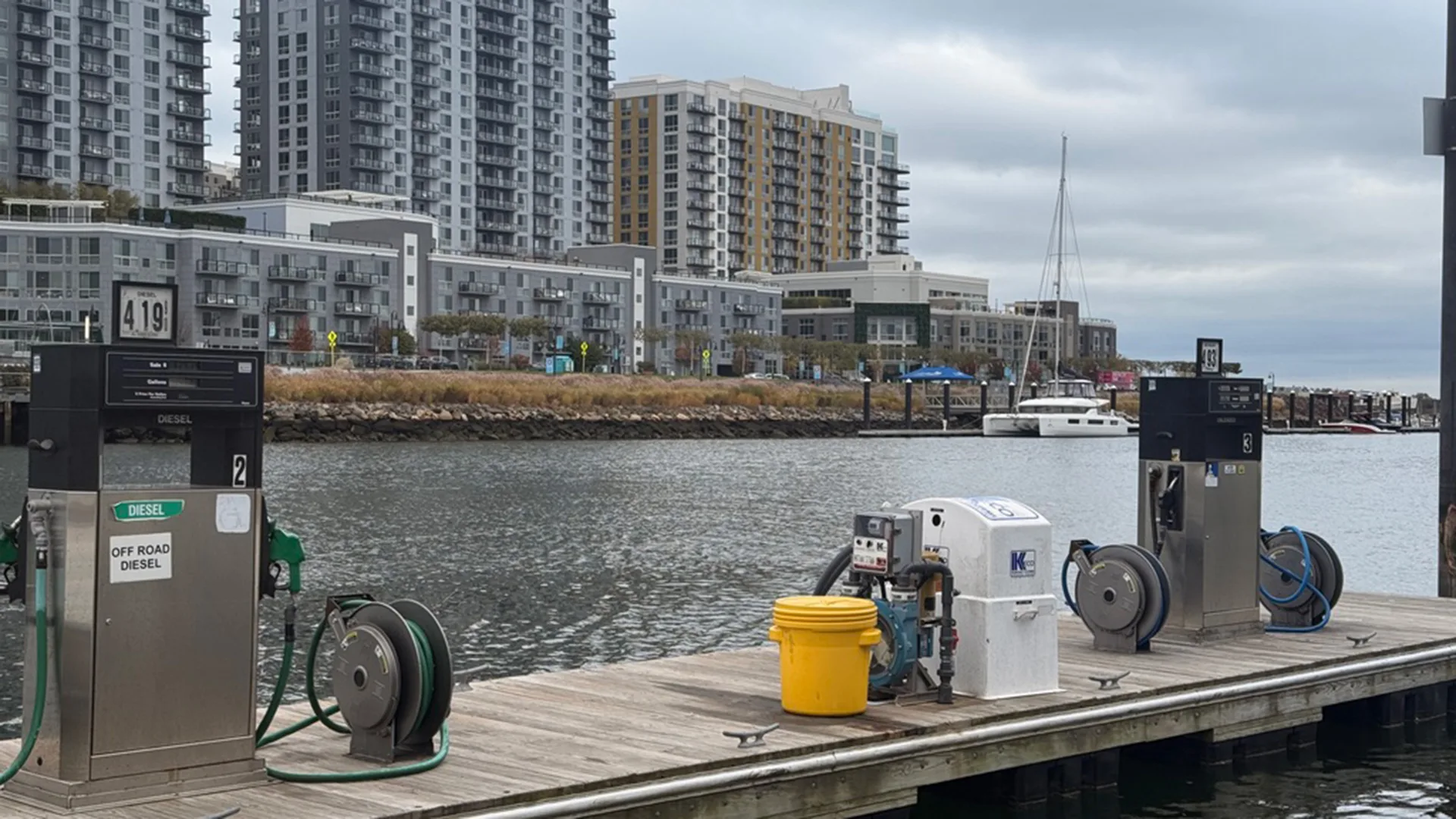 Stamford fuel dock with pumps and boats on the harbor