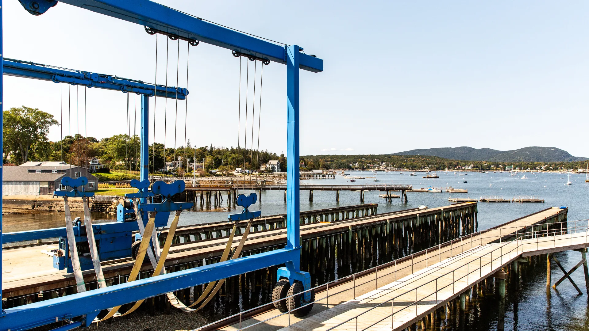 Blue marine lift positioned on the Southwest Harbor dock