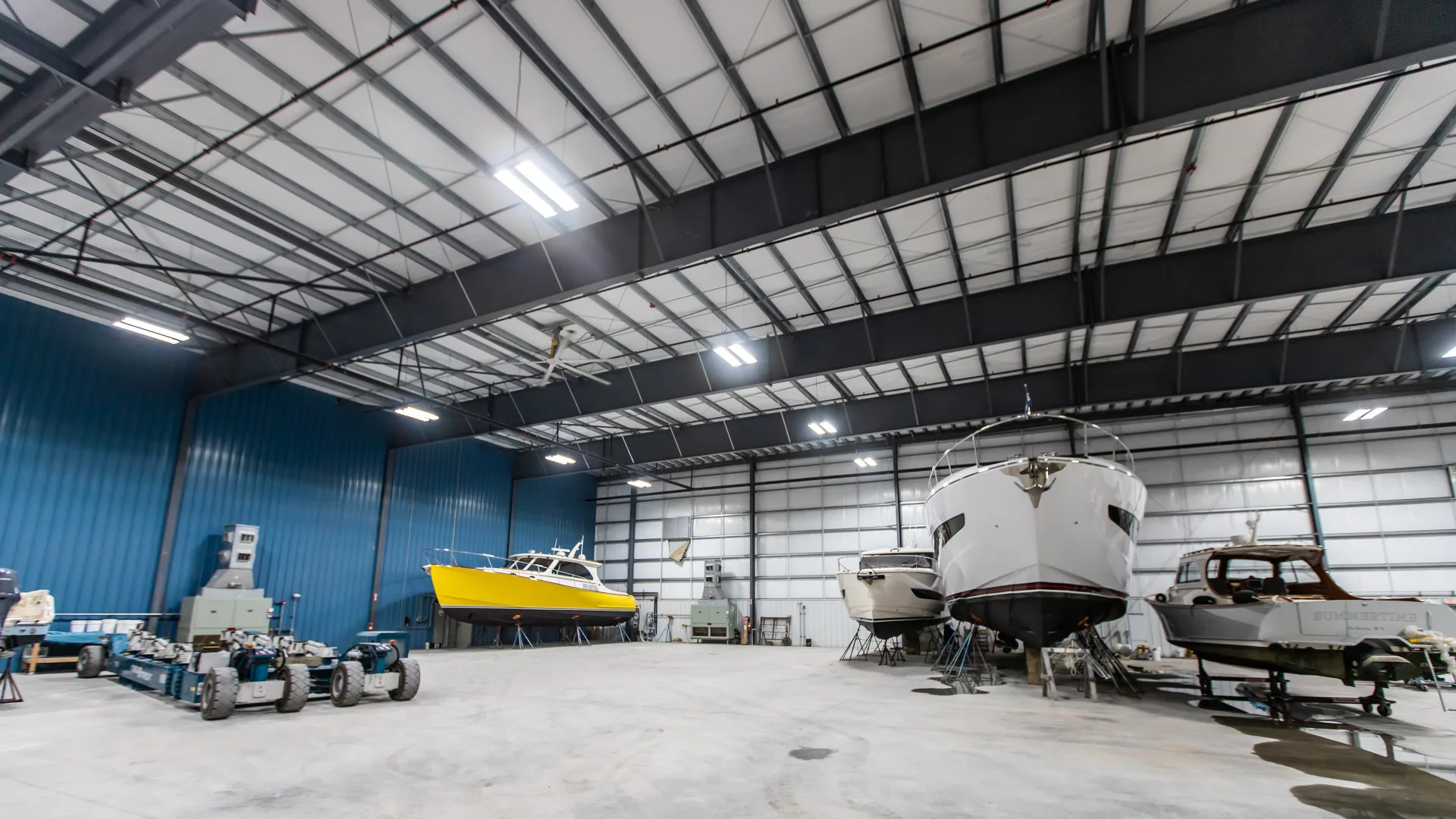 Boats stored in rows inside the Stuart hurricane-rated building