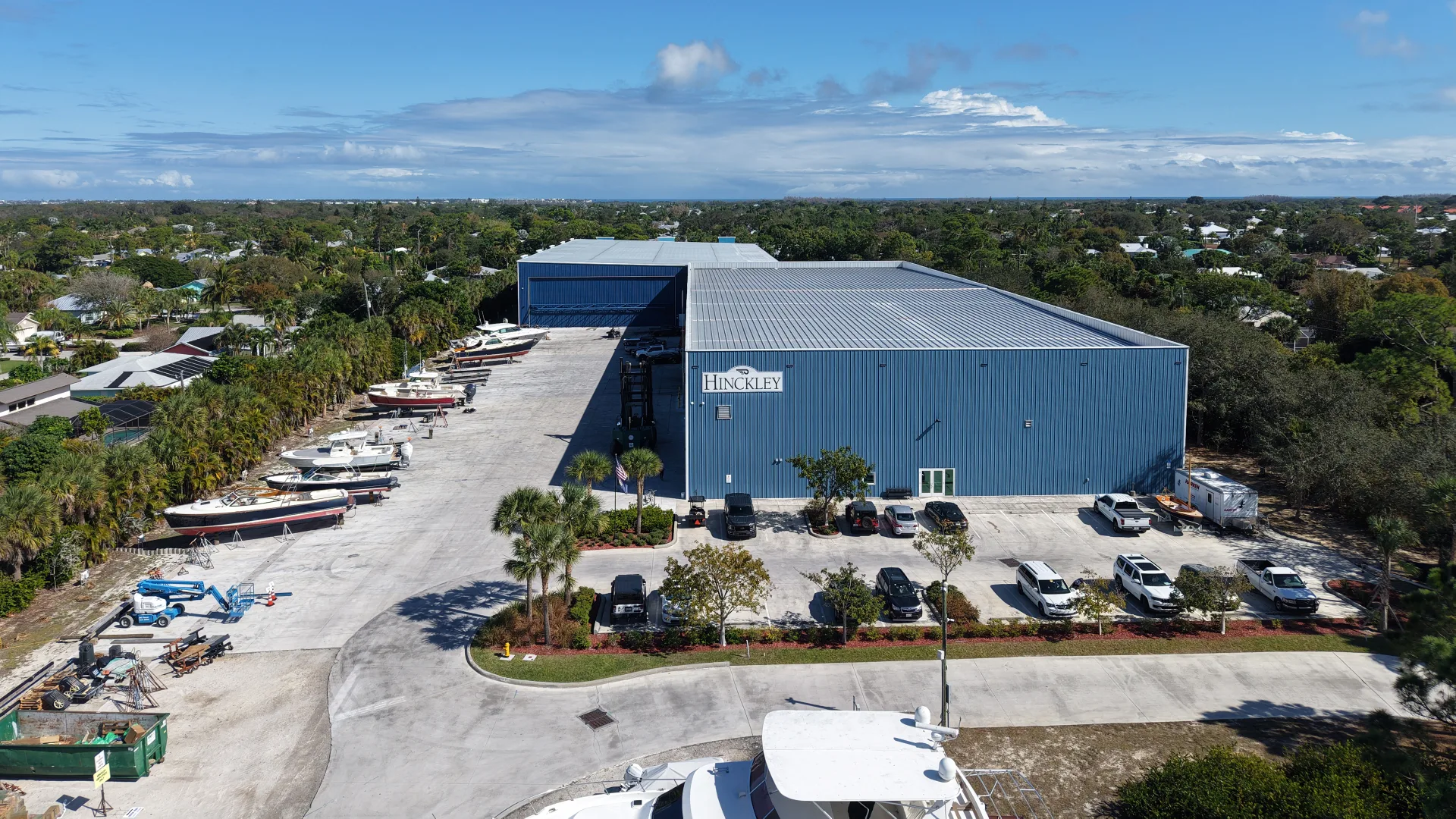 Aerial view of Stuart service buildings, storage sheds, and marina slips