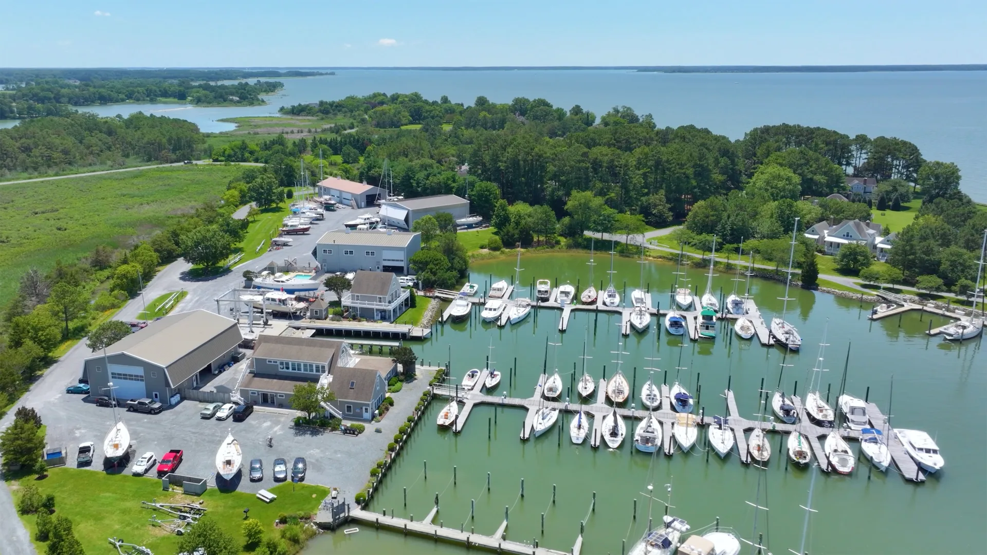 Aerial view of Oxford marina slips, boats, and service yard buildings