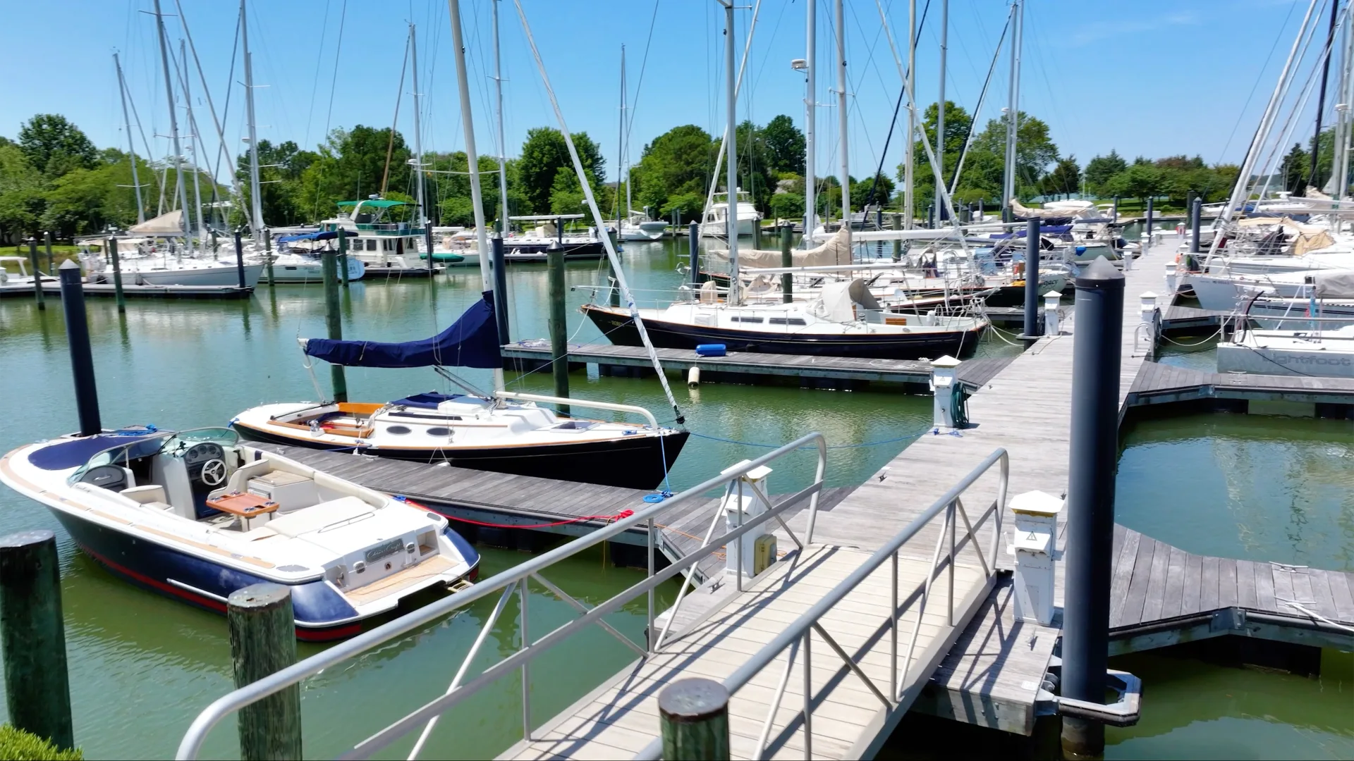 Oxford marina slips with boats docked beside the service yard