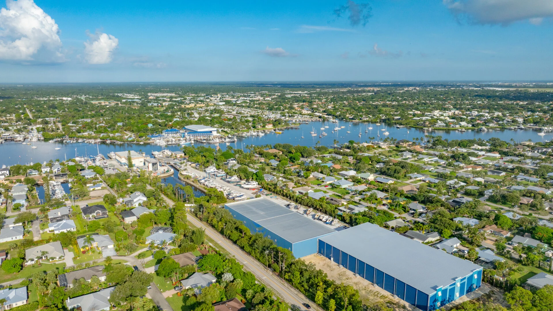 Aerial view of Hinckley Yacht Services’ Treasure Coast storage facility and surrounding waterfront neighborhood in Florida.