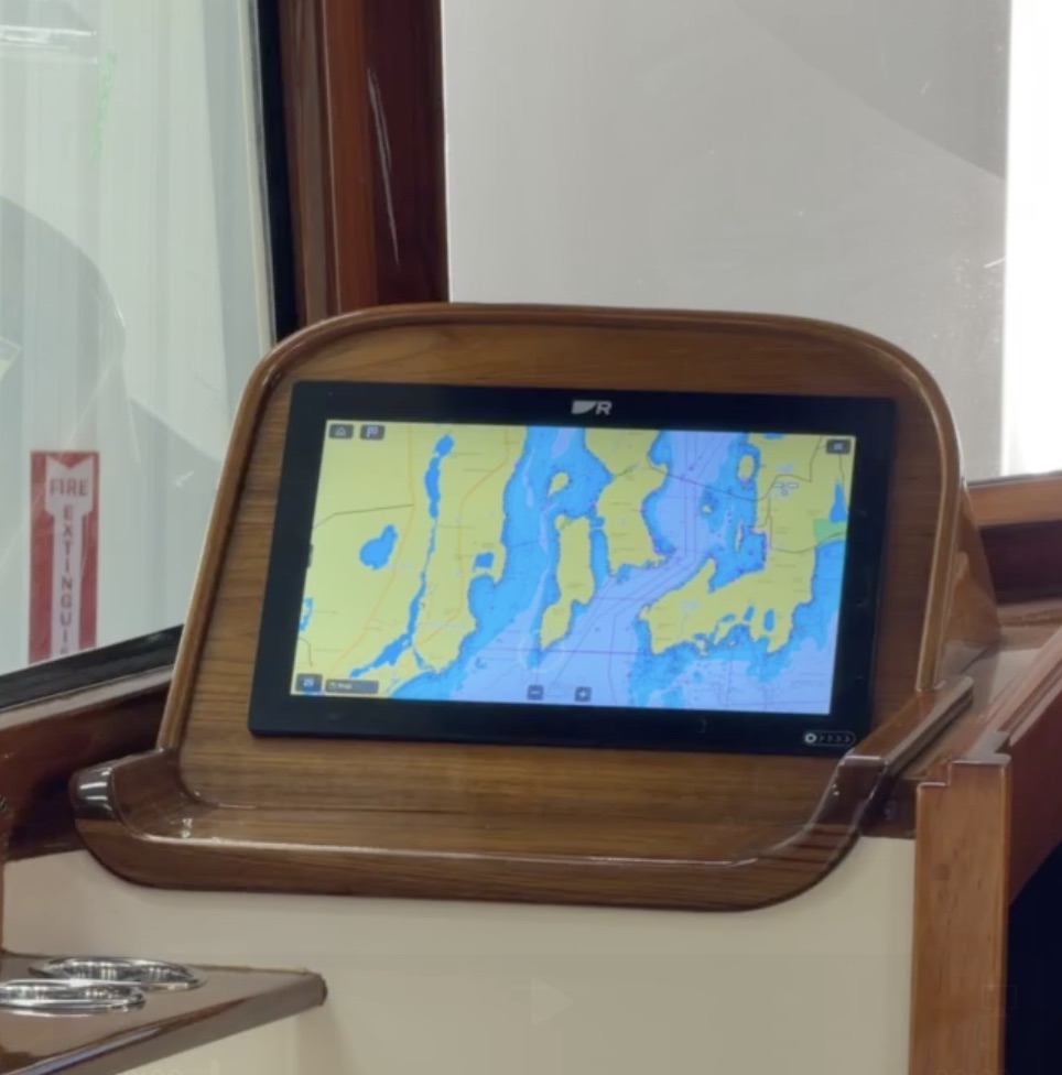 Marine navigation display showing digital chart inside Hinckley yacht helm station