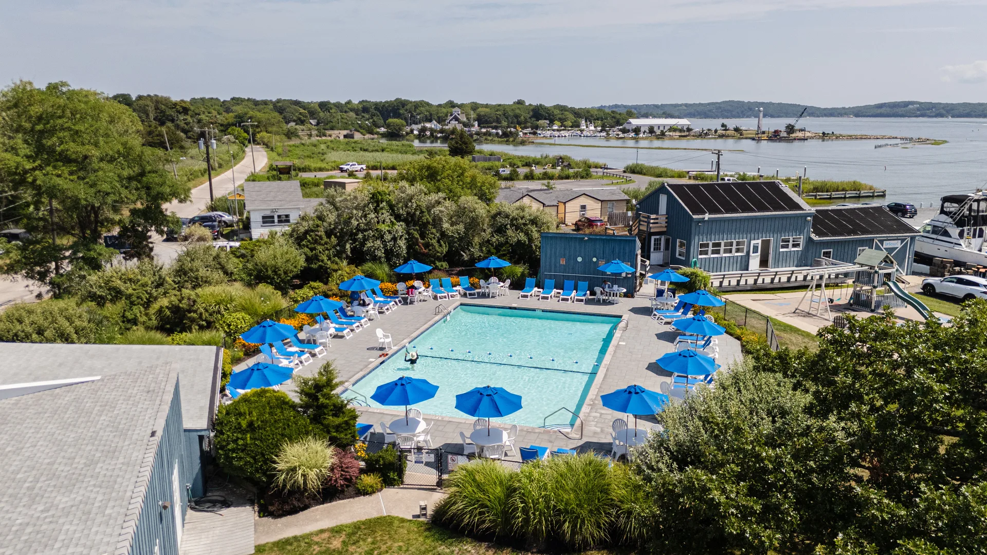 Aerial view of Port of Egypt pool, marina buildings, and docks