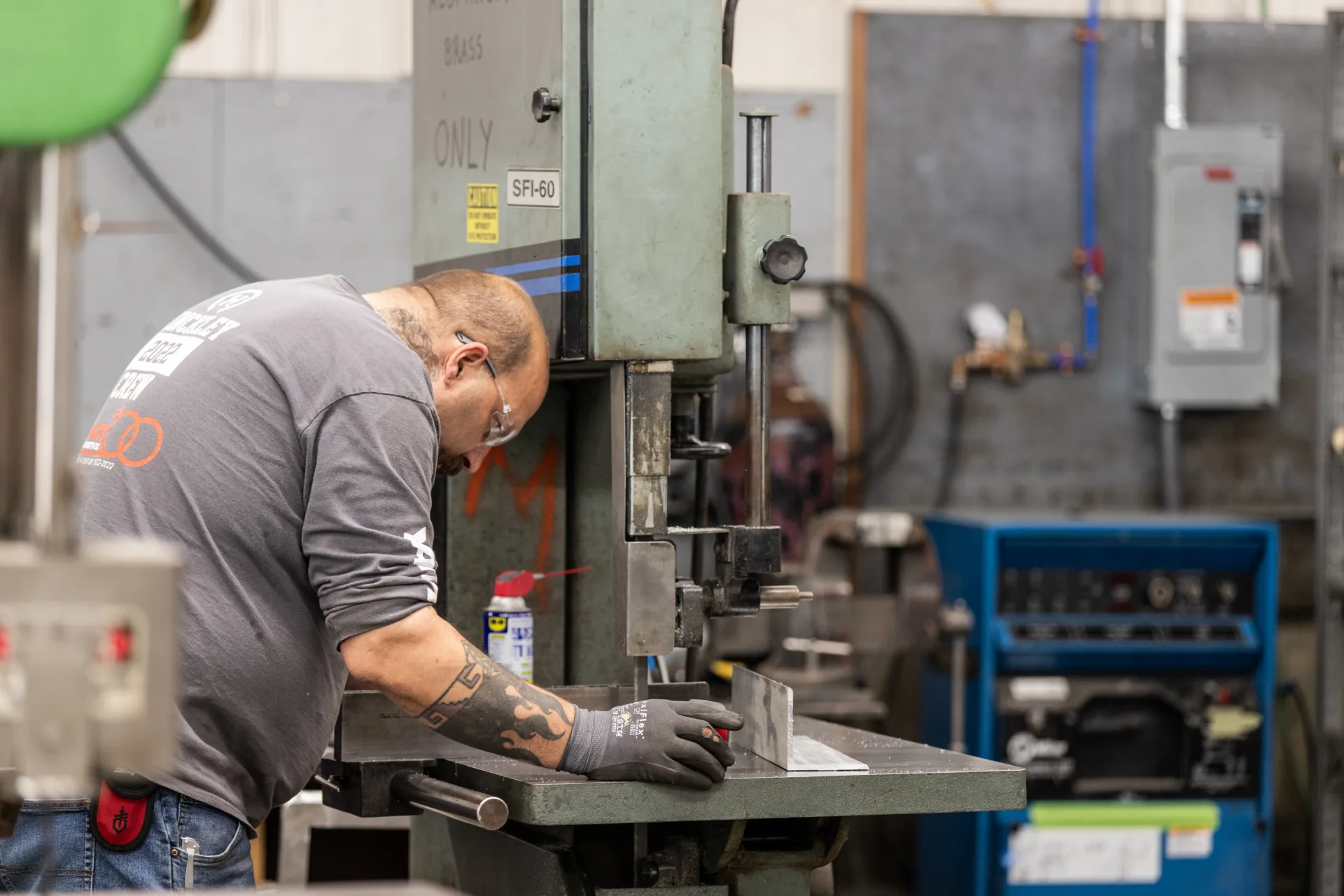Technician using tools at a machine shop station in Northeast Harbor