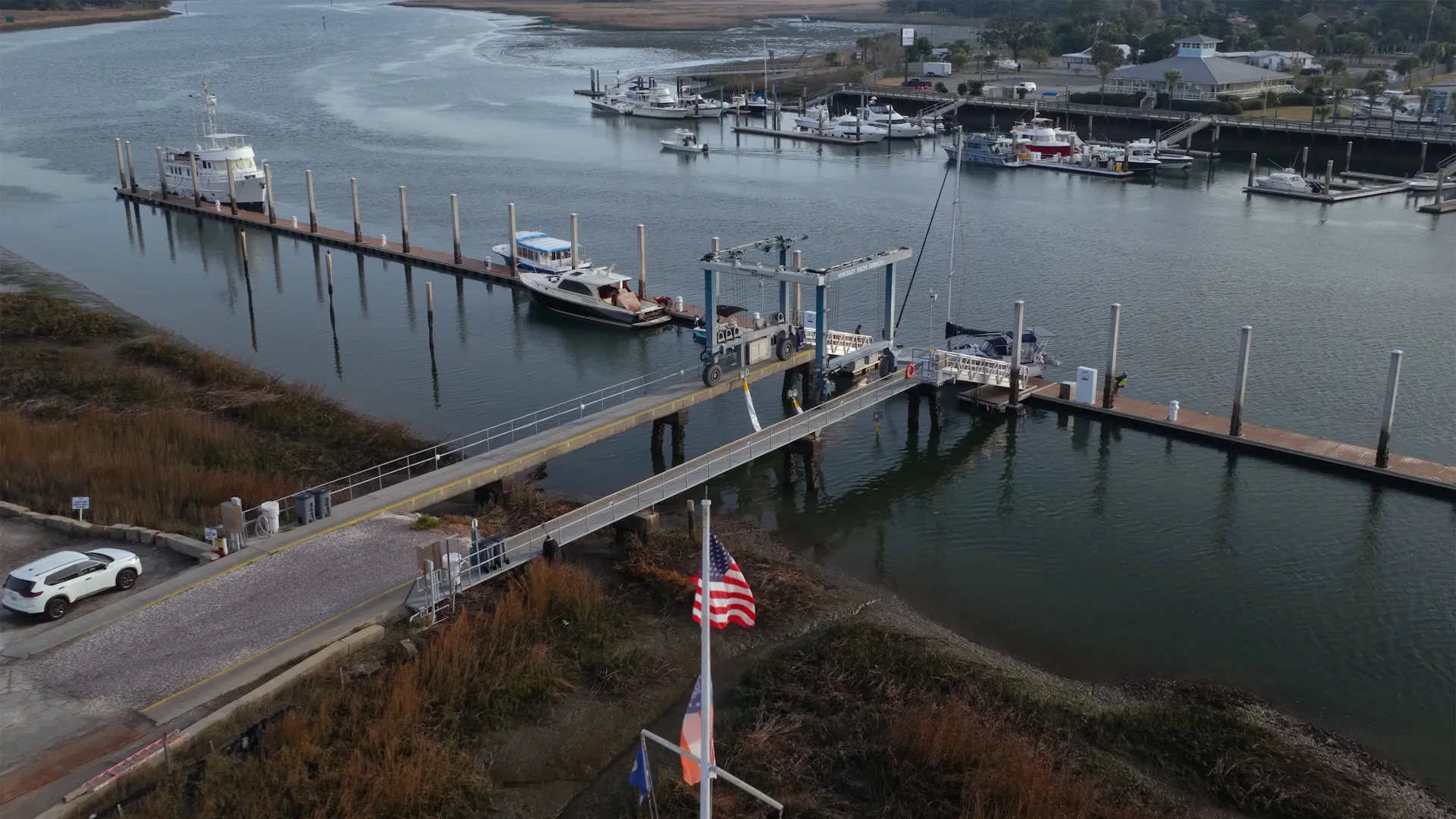 Savannah riverfront dock with boats beside the service yard
