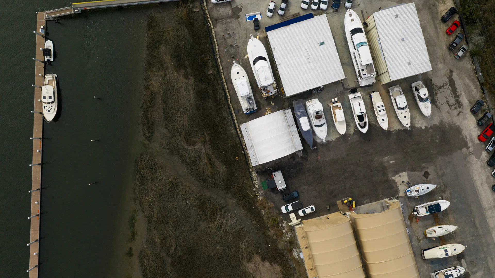 Overhead view of boats stored between Savannah yard sheds