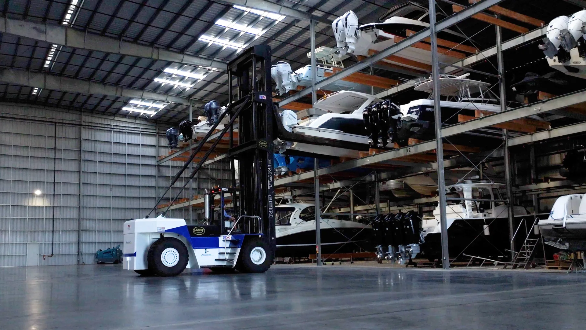 Indoor rack storage with stacked powerboats at the Fort Myers facility